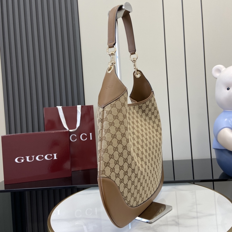 G*u*i top handle bags